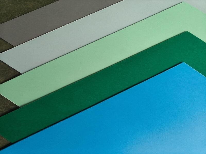 PVC sheet flooring installation tools laid out on subfloor